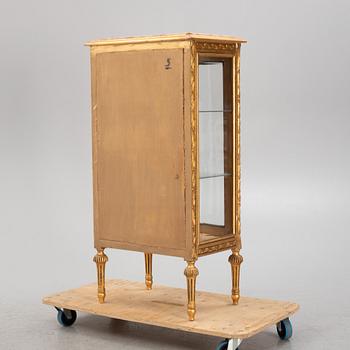A Louis XVI-style display cabinet, second half of the 20th Century.