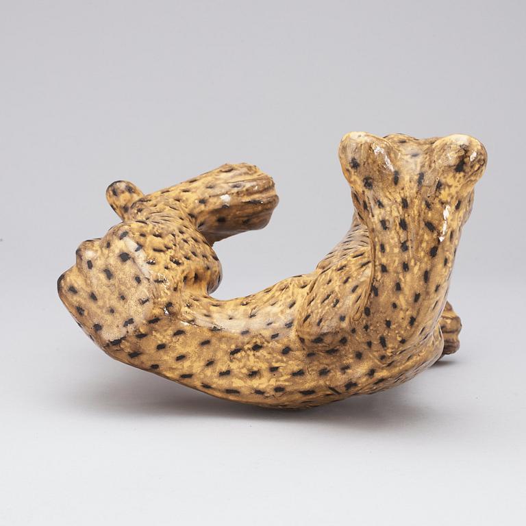 A Vicke Lindstrand yellow glazed ceramic figure of a cheetah, Upsala-Ekeby 1949, model 3003.