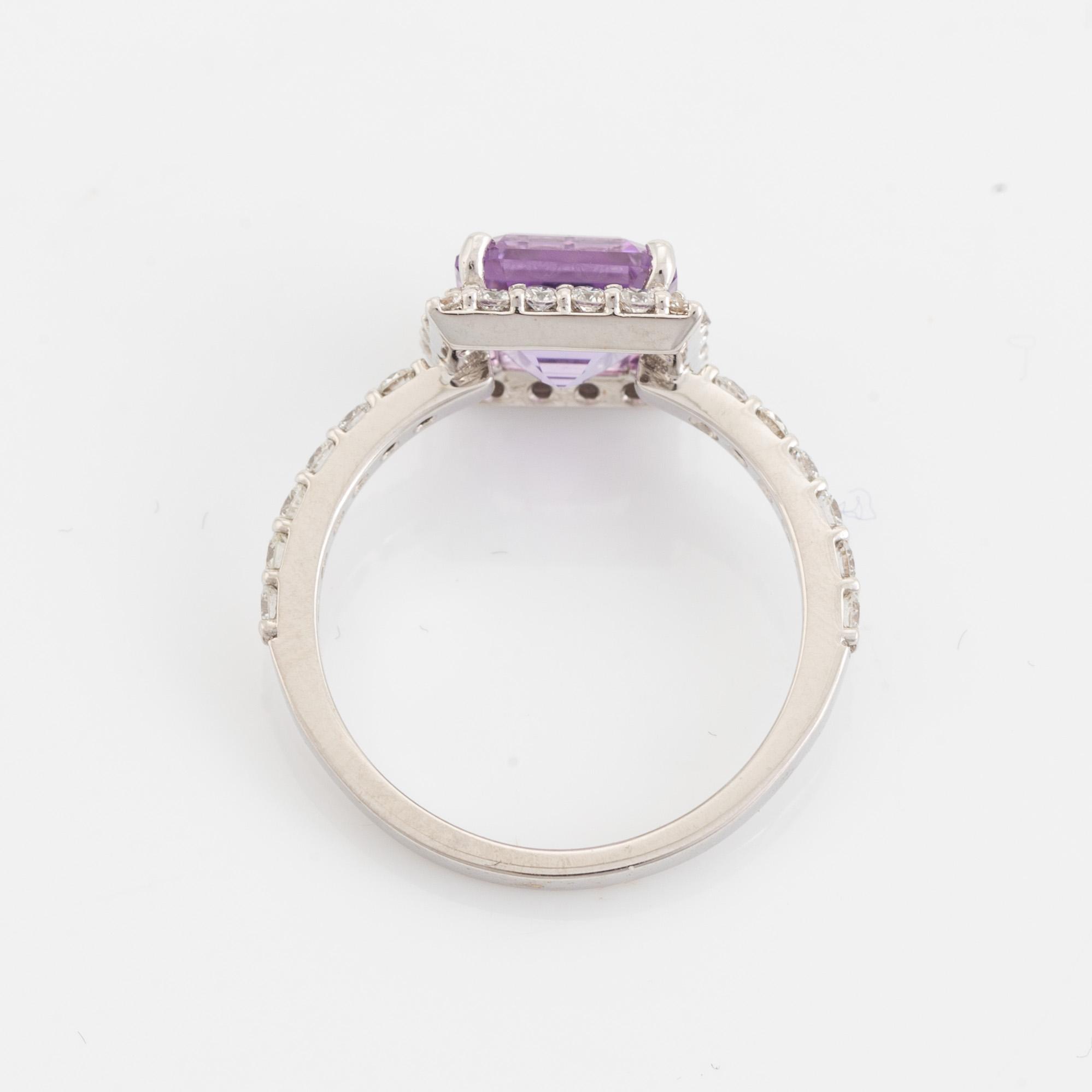 Amethyst and brilliant cut diamond ring.
