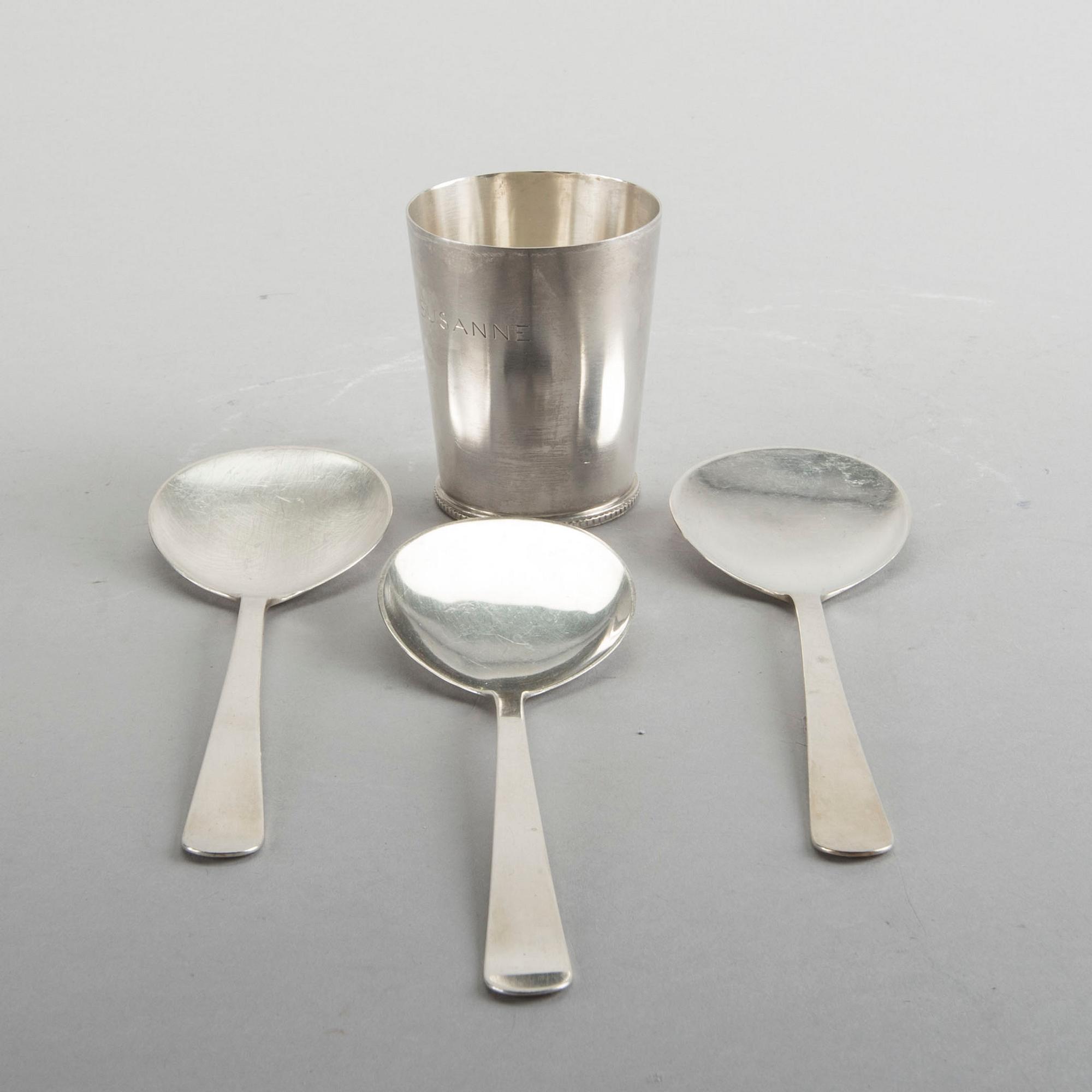 A Swedish 20th century sterling set of three sandwich spoons ad a beaker mark of W Nilsson Lund 1965, 1967 and 1946,