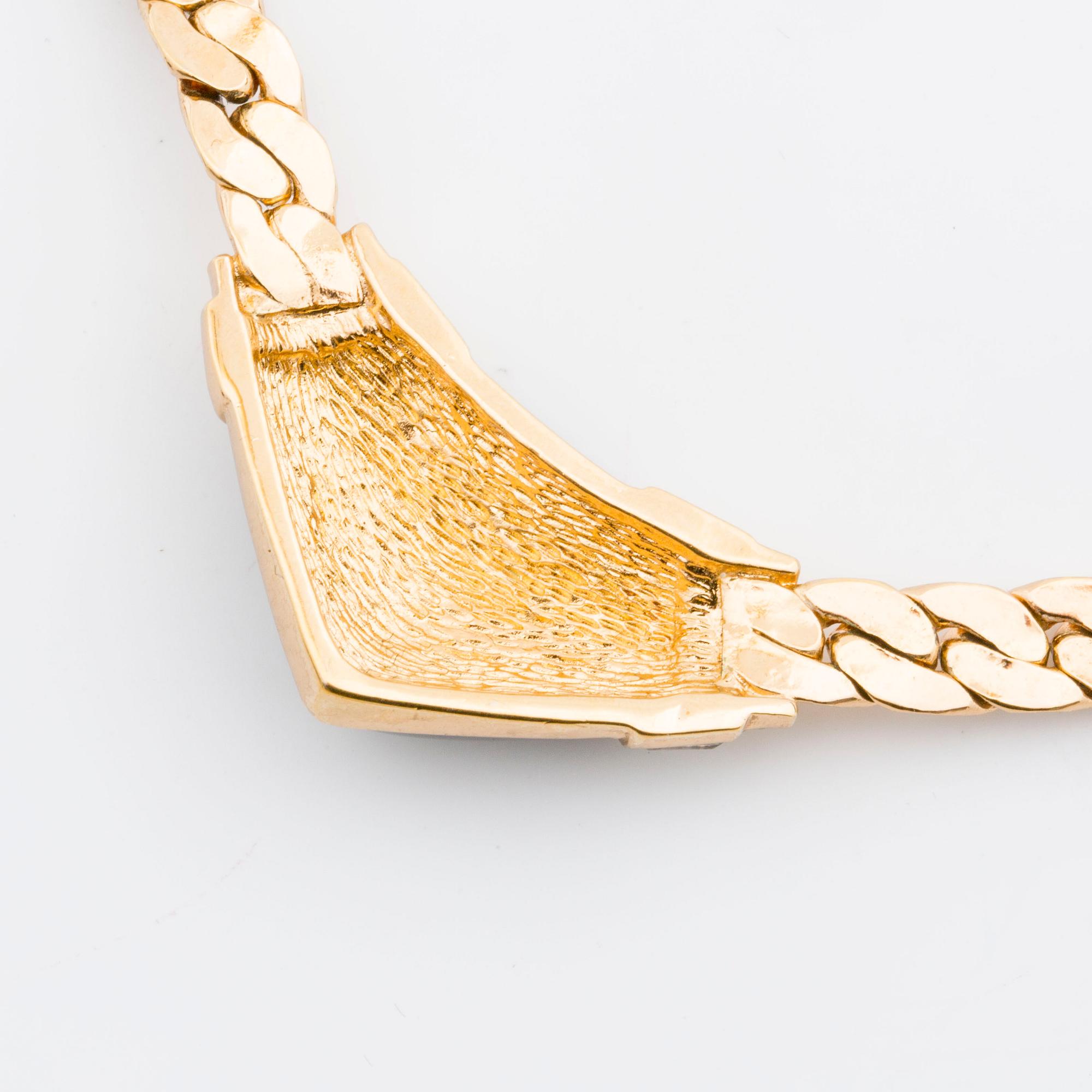 CHRISTIAN DIOR, necklace and two pairs of earrings.