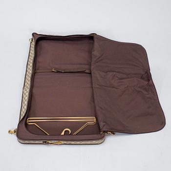 Gucci, a 'Savoy' garment bag.