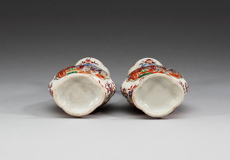 A pair of famille rose vases, Qing dynasty, Qianlong (1736-95).