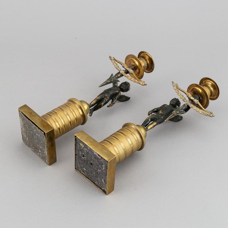 A pair of Empire candlesticks, first half of the 19th-century.