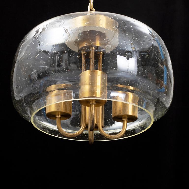 A 1960/70s glass and brass ceiling lamp.