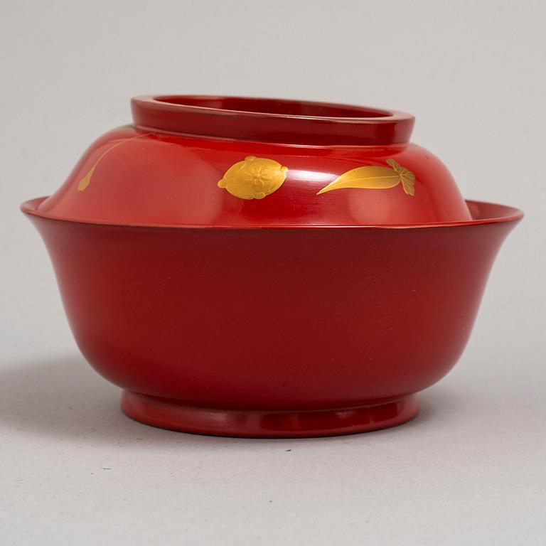 Eight lacquered bowls with covers, Japan, 20th century.