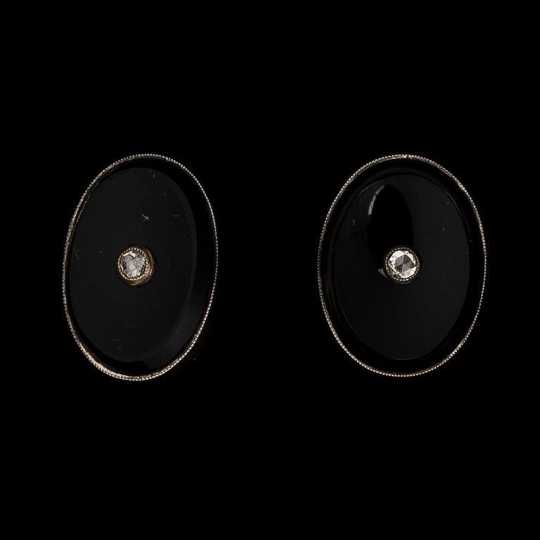 A PAIR OF CUFFLINKS, onyx, rose cut diamonds, 18K gold. Suomen Kultasepät, Turku Finland 1923.