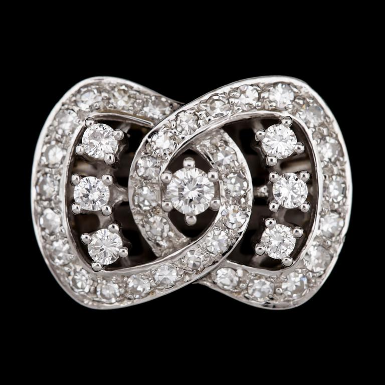 CLASP, brilliant- and eight cut diamonds, tot. app. 1.20 cts.