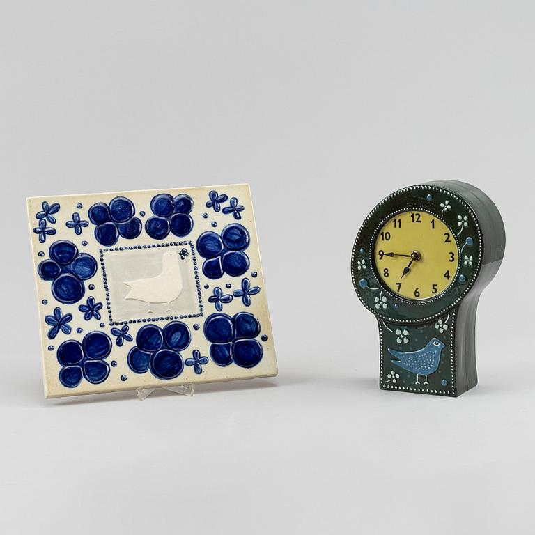 Sylvia Leuchovius, a stoneware wall relief and a table clock, Rörstrand Ateljé.