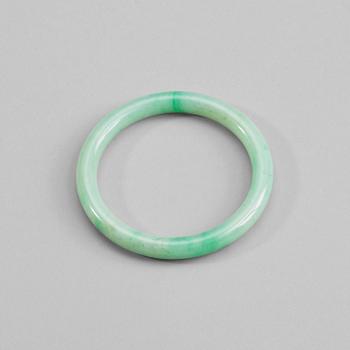 205. A green jadeite bangle, China, 20th Century.