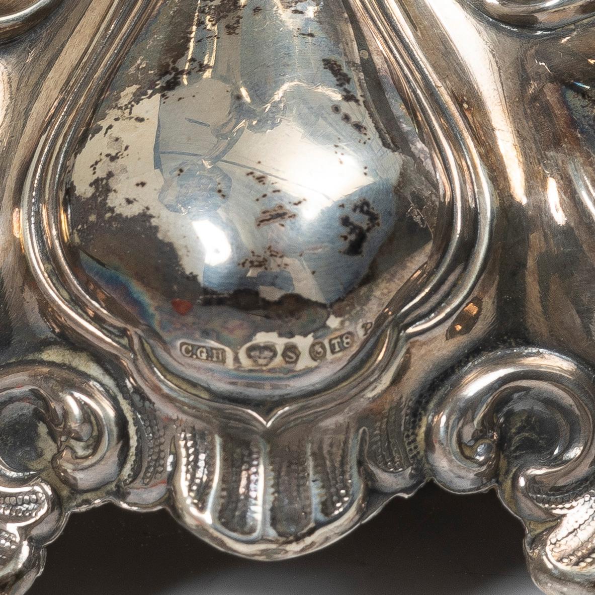 A pair of Baroque style silver candelabras, C.G.Hallberg, Stockholm, Sweden, 1945.