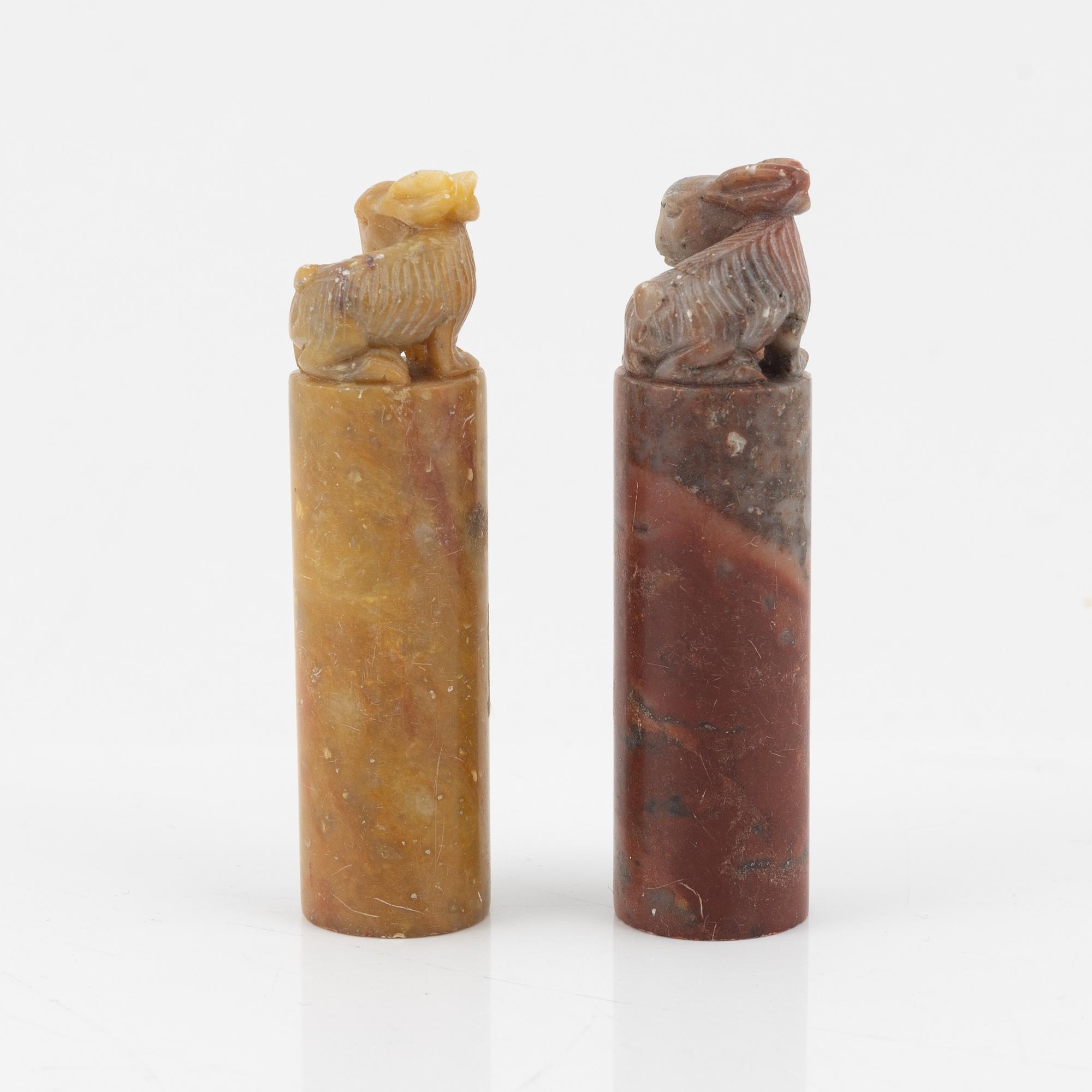 A set of four stone scholars objects and a enameled silver box with cover, Qing dynasty, circa 1900.