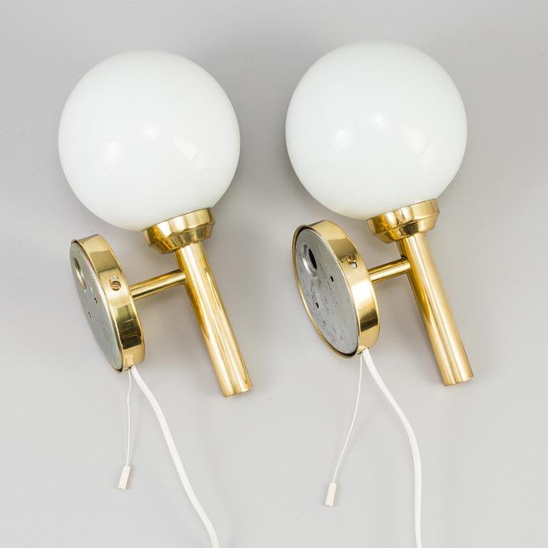 A pair of 20th century brass wall lights by Abo Denmark.