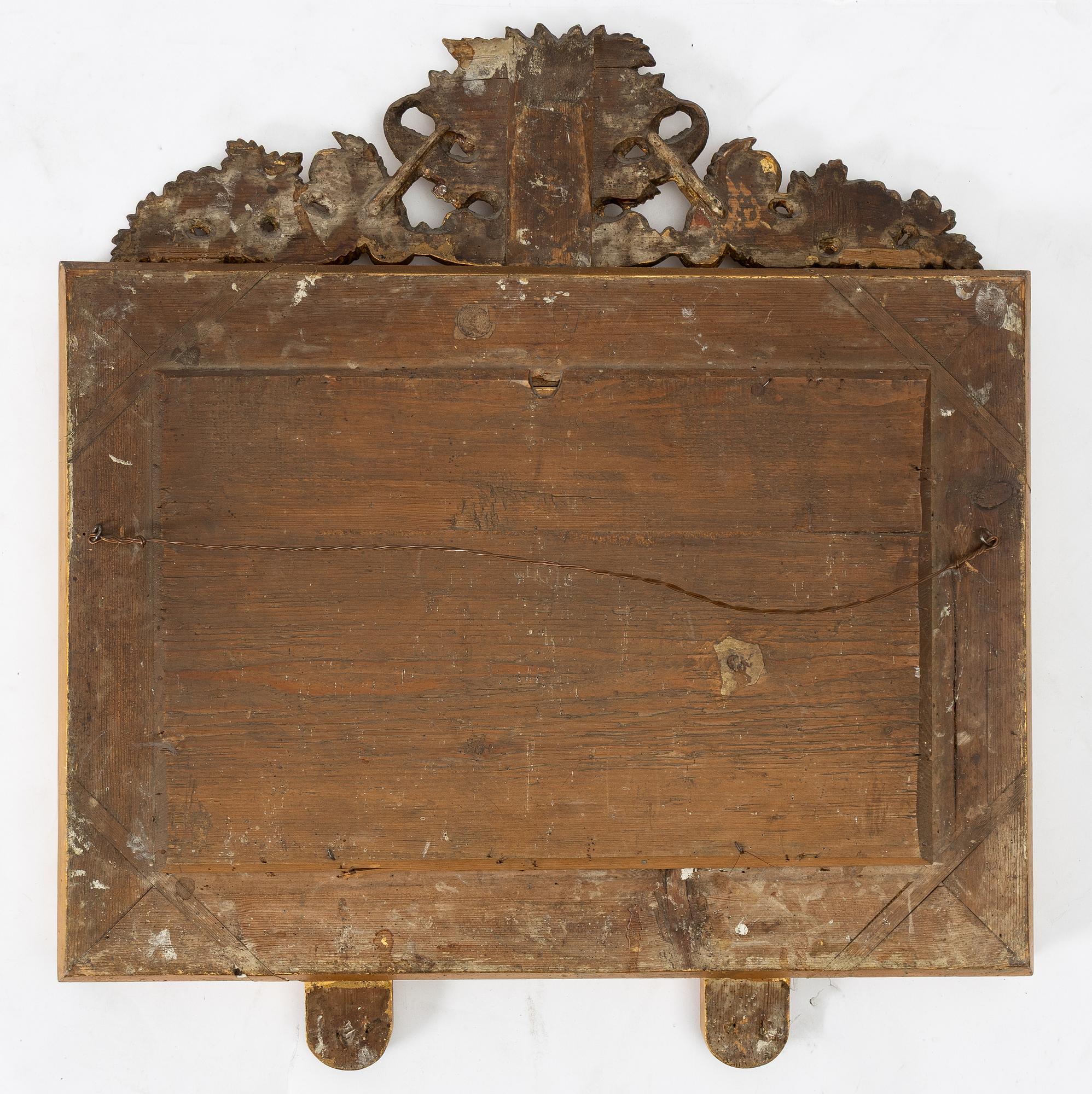 A pair of Late Empire gilded mirror sconces for two candles, Gothenburg, 1830s-40s.