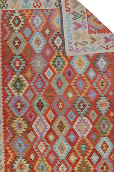 A RUG, kilim, ca 290 x 207 cm.