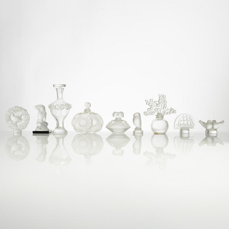 Lalique, four perfume bottles and five figurines, France, after 1945.
