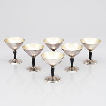 Folke Arström, an 8 pcs alpacca/ silver plated cocktail set, Guldsmedsaktiebolaget (GAB), Stockholm 1930s-50s.