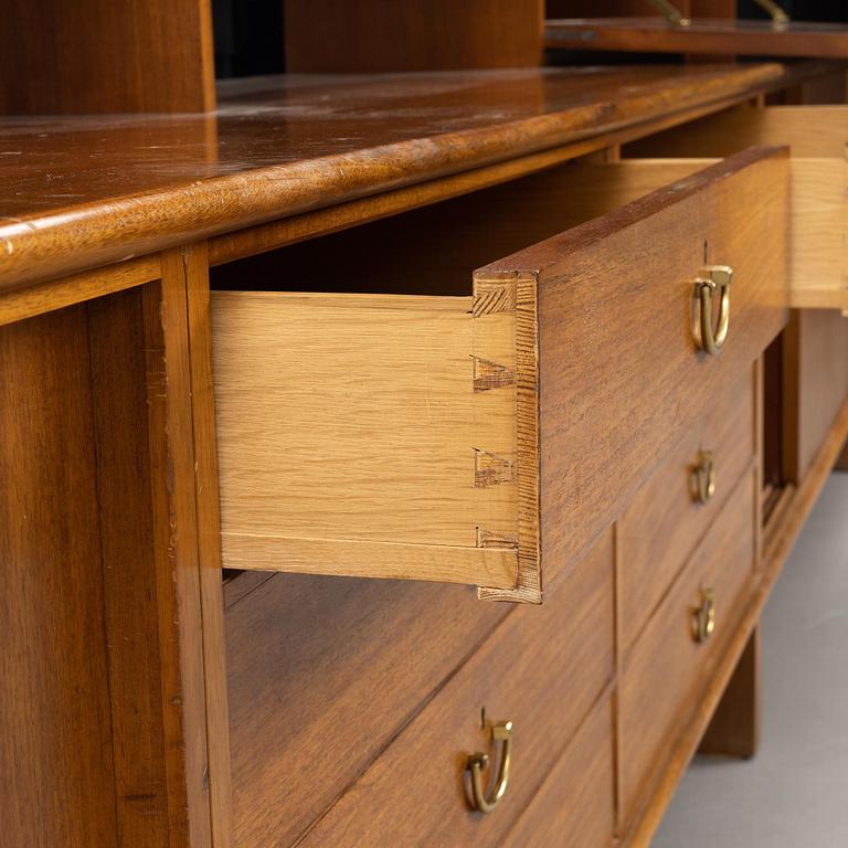 Josef Frank, a mahogny sideboard with cabinets, shelves, writing flap and drawers, Svenskt Tenn, a special commission, 1940-50s.