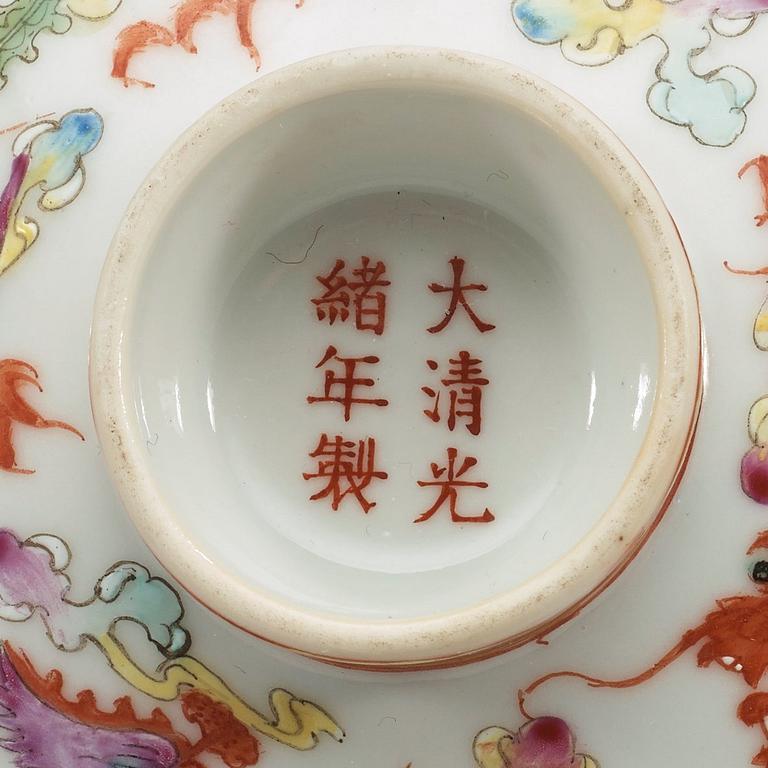 A set of three famille rose bowls with covers, Qing dynasty with Guangxu six character marks and period (1874-1908).