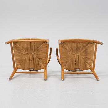 A pair of oak 'Y-chairs' by Hans J Wegner for Carl Hansen & Son, designed 1949.