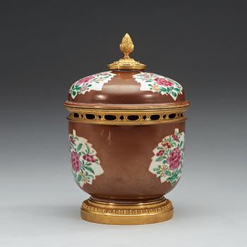 A bronze mounted famille rose jar with cover, Qing dynasty, Qianlong (1736-95).