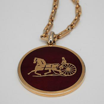 CÉLINE, a necklace.