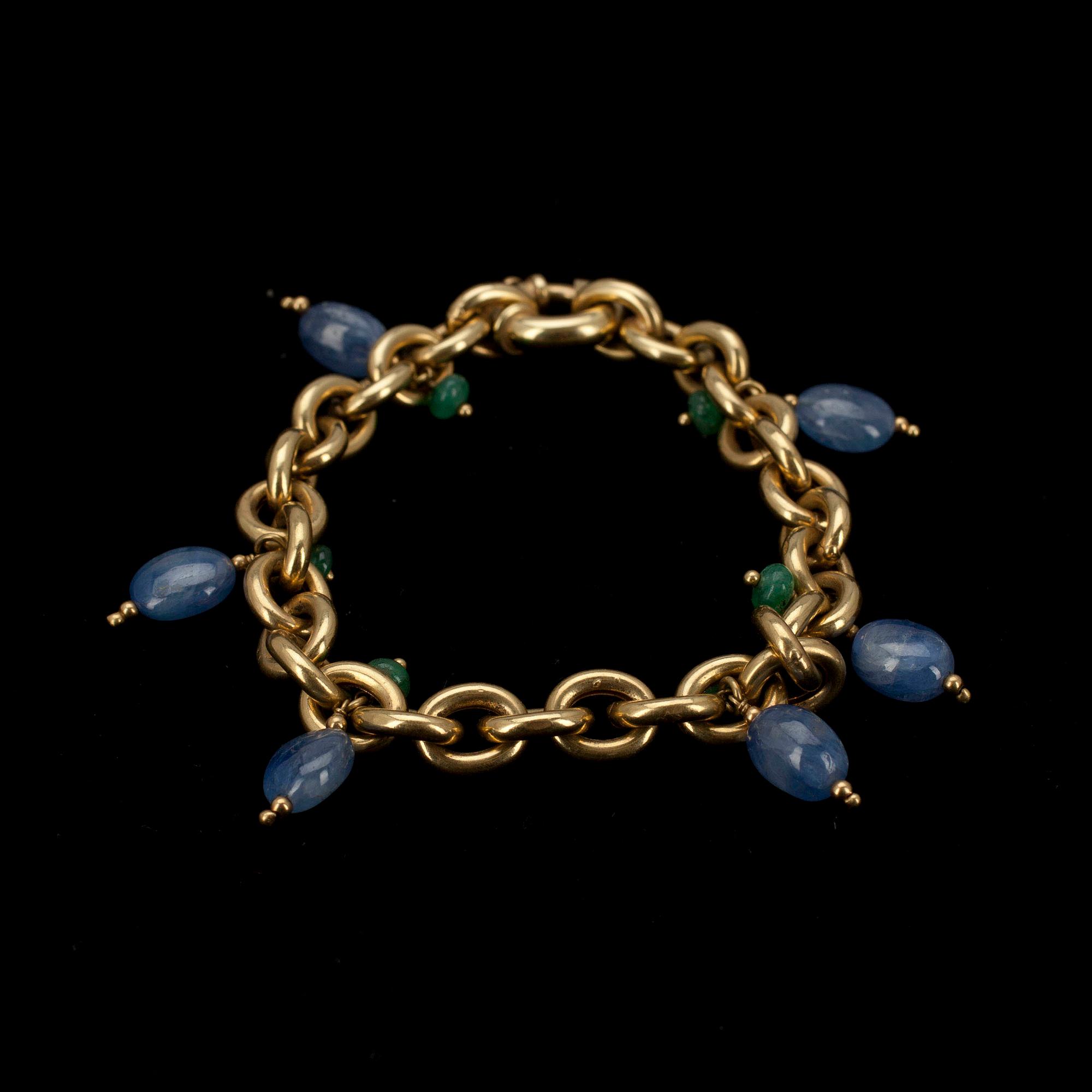ARMBAND, 18k guld med safirer och smaragder, 1900-talets slut, totalvikt 29 g.