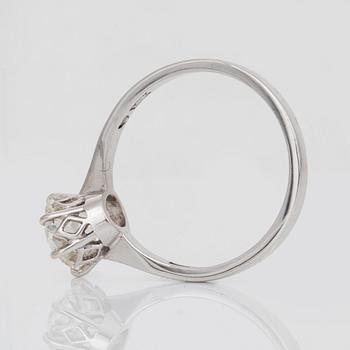 An old cushion-cut diamond solitaire ring.
