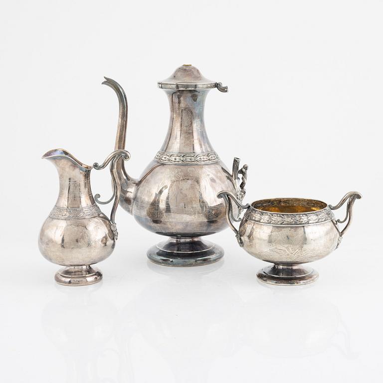 A Swedish Silver Coffee Pot, Creamer and Sugar Bowl, marks of GAB, Stockholm 1875-1897, and GT Folcker 1875.