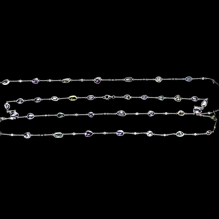 COLLIER, olikfärgade safirer, tot. 33.50 ct, med briljantslipade diamanter, tot. 2.09 ct.