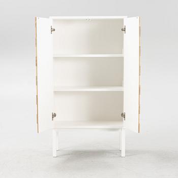 Sara Larsson a 'Collect 2016' cabinet for A2.