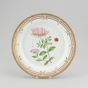 A Royal Copenhagen porcelain "Flora Danica" round serving plate model no 3524.