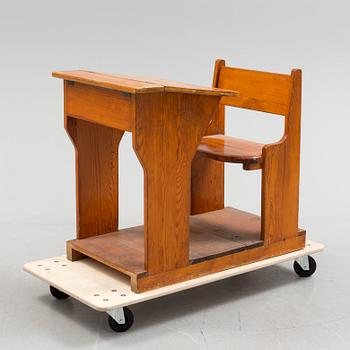 A first half of the 20th century school bench.