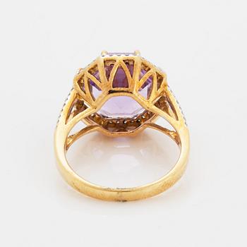 An amethyst ring.