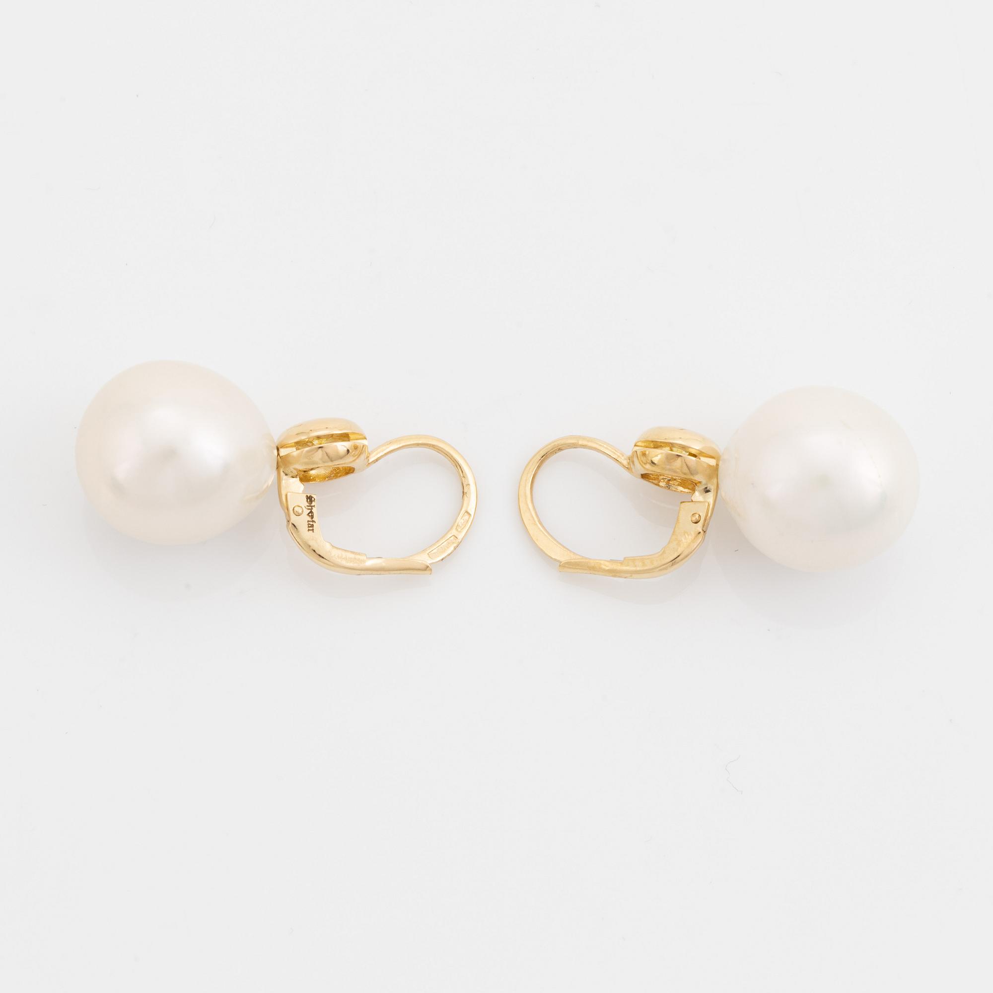 Freshwater pearl and colour treated yellow diamond earrings.