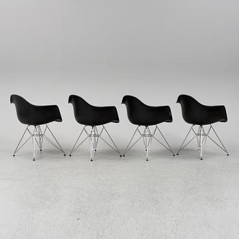 CHARLES AND RAY EAMES,  4  Eames Plastic Armchair, Vitra 2010.