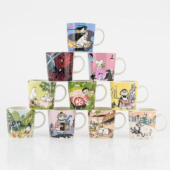 Eleven porcelain Moomin mugs, Arabia, Finland.