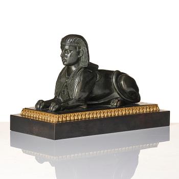 A French Empire bronze sfinx.