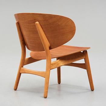 A HANS J WEGNER, a  "Shell set/ Skalsæt" comprising a sofa, a chair and a table, Fritz Hansen, Denmark 1950's.