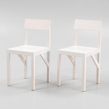A pair of signed white stained pine 'Bracket Chairs' by Frederik Gustav for Frama, Copenhagen 2023.