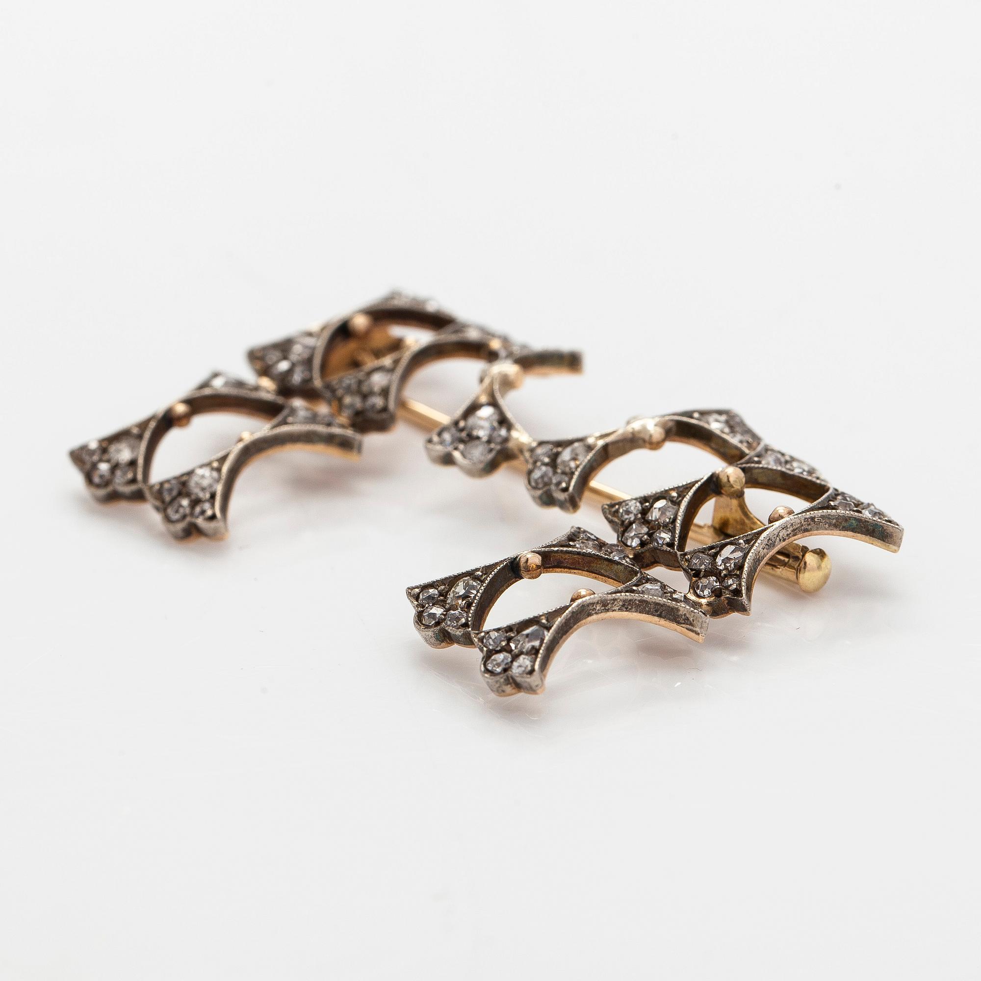 Brooch, 14K gold, silver, old cut diamonds.