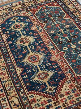 A RUG. An antique Anatolian, probably Megri. 185,5 x 137 cm (as well as one end with six cm flat weave).