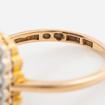 Ring in 18K gold with a faceted amethyst and octagon-cut diamonds.