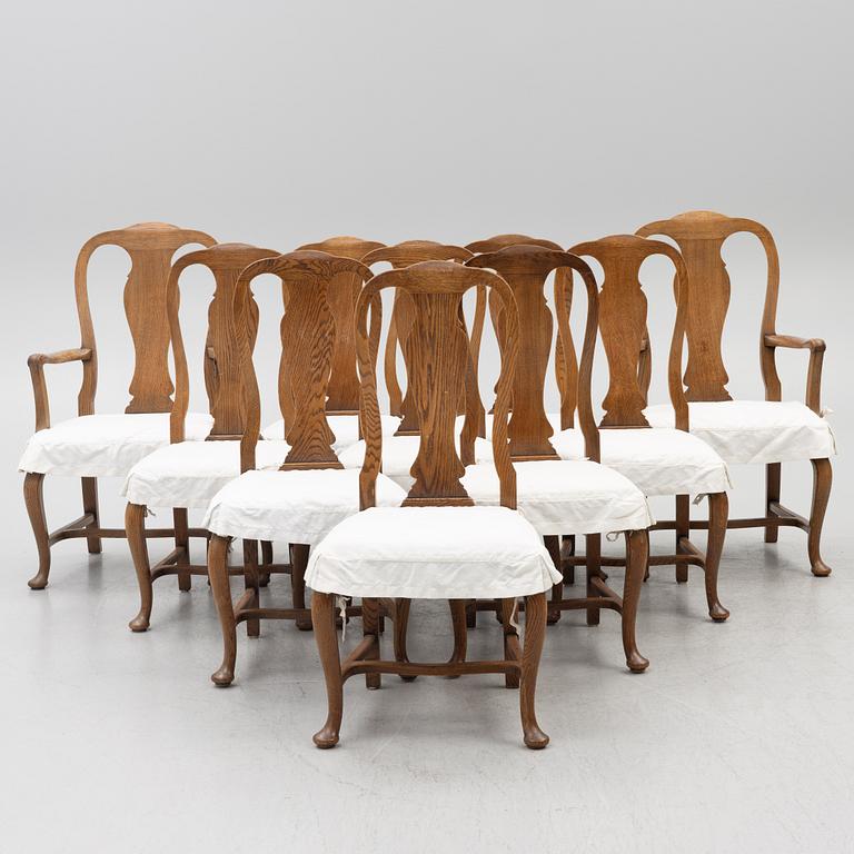 Dining table, 8 chairs, 2 armchairs, sideboard, Rococo style, early 20th century.