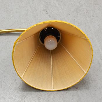 A model 2484 brass wall light by Josef Frank for Firma Svenskt Tenn.