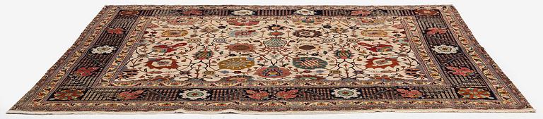 A semi-antique Tabriz carpet, Northwest Persia, of Safavid 'Vase' design, c.328 x 242 cm.