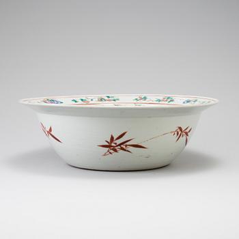 A large Chinese porcelain famille rose basin with figural scenes, Qing dynasty, 19th Century.