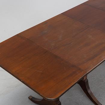 A mahogany dining table with folding and additional leaves, Nordiska Kompaniet, designed 1945.