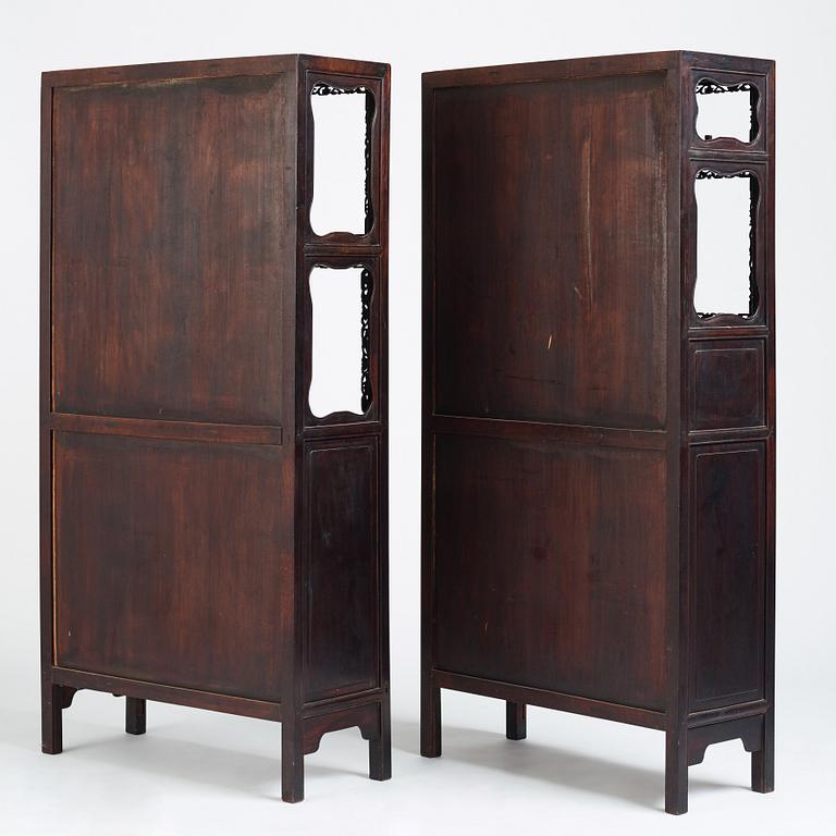 A pair of Chinese hardwood display cabinets, Qing dynasty, 19th Century.