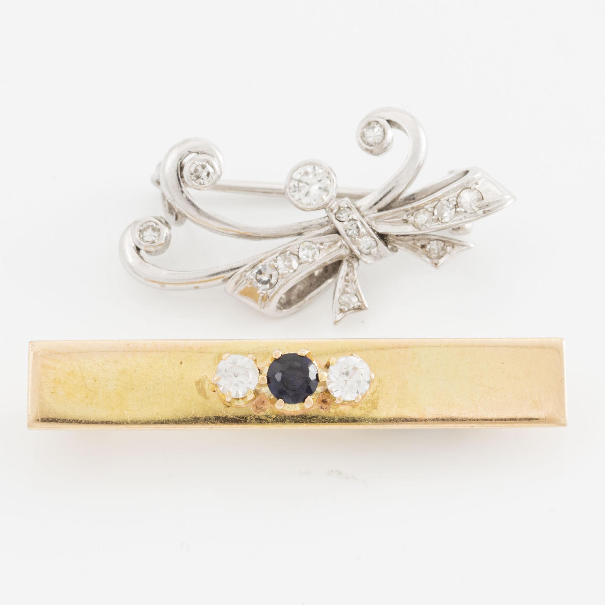 Two brooches, platinum and 18K gold.